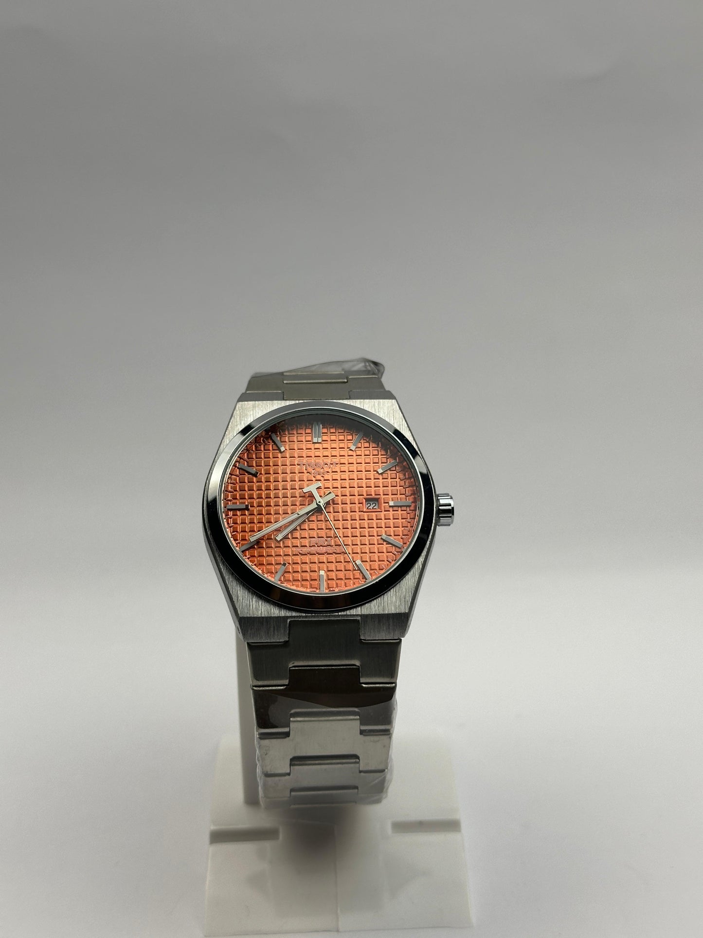 Men's Tissot Stainless Steel Watch – Orange Textured Dial with Date | Tick Empire
