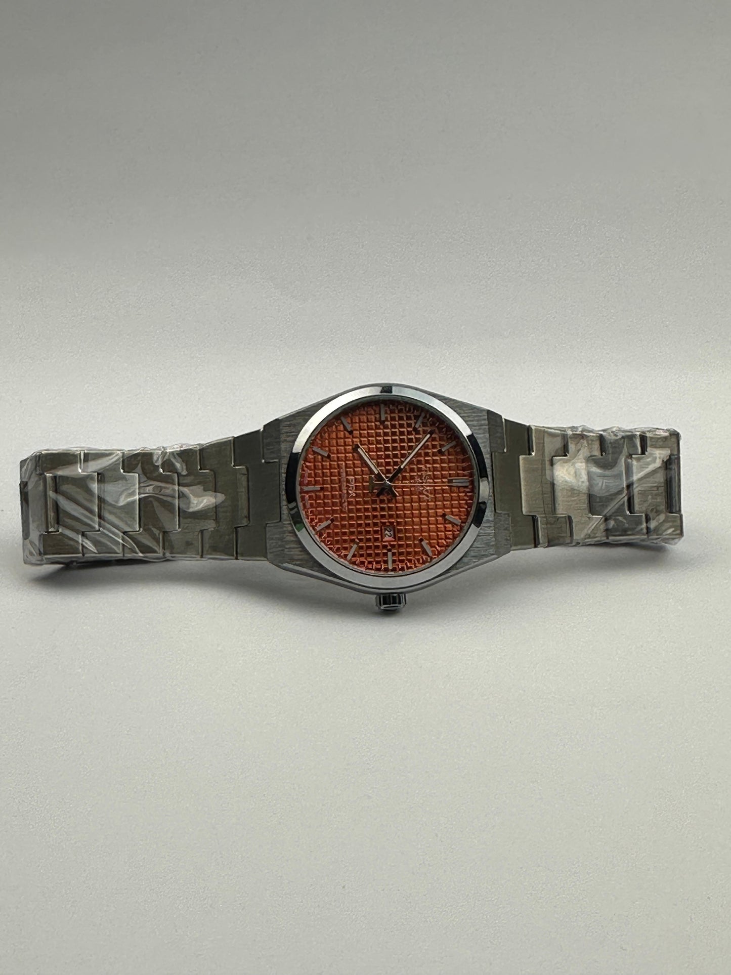 Men's Tissot Stainless Steel Watch – Orange Textured Dial with Date | Tick Empire